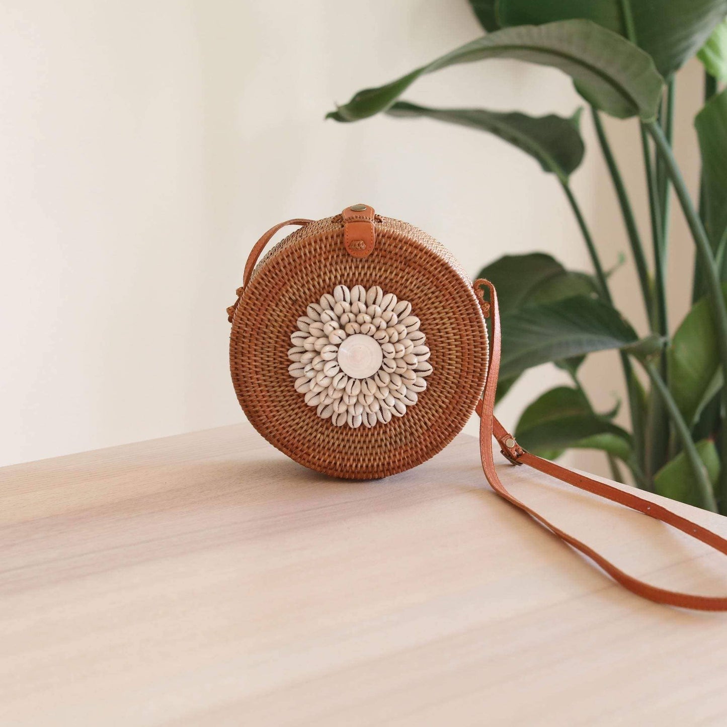 Ganapati Bali Rattan Crossbody Bag with Seashell Embellishment