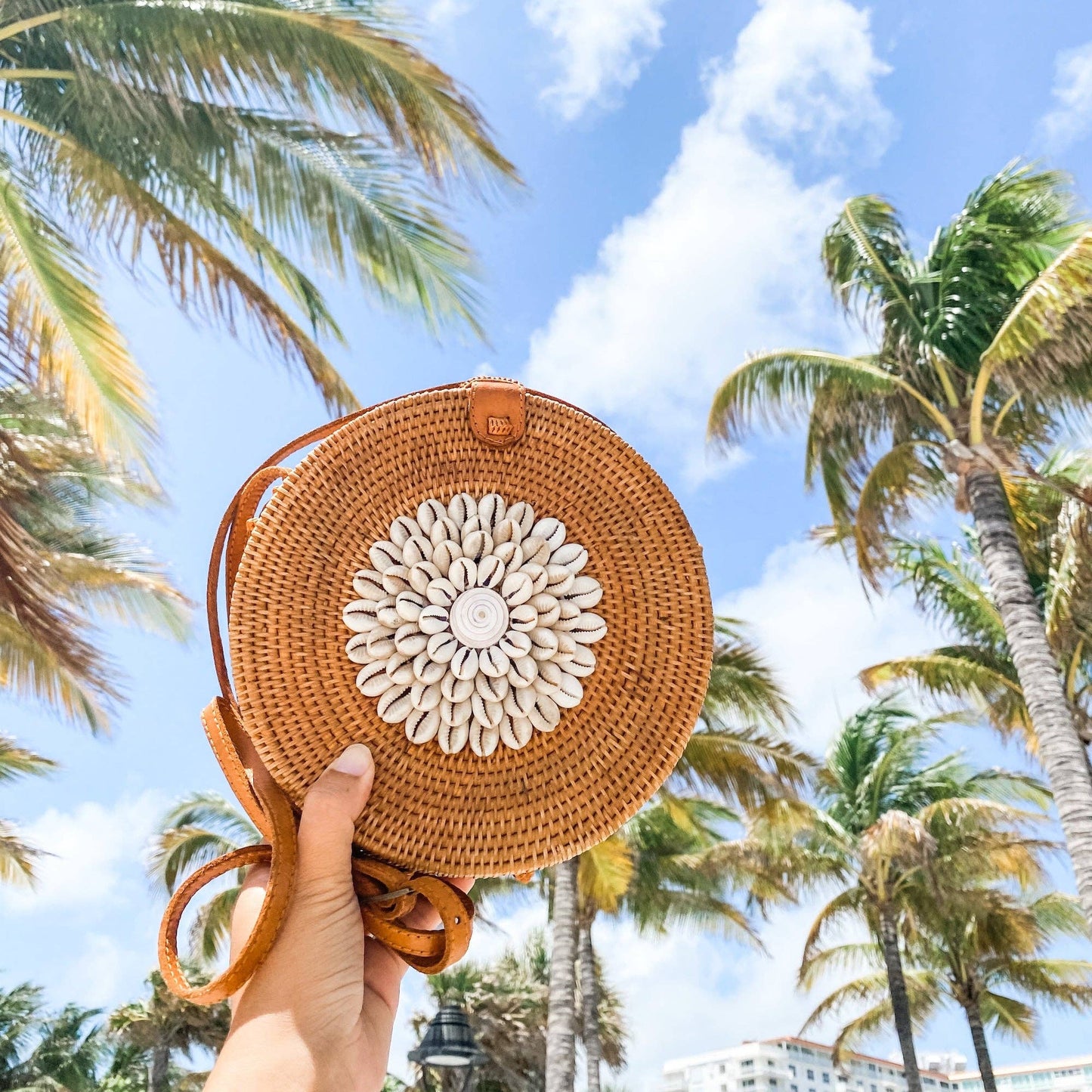 Ganapati Bali Rattan Crossbody Bag with Seashell Embellishment